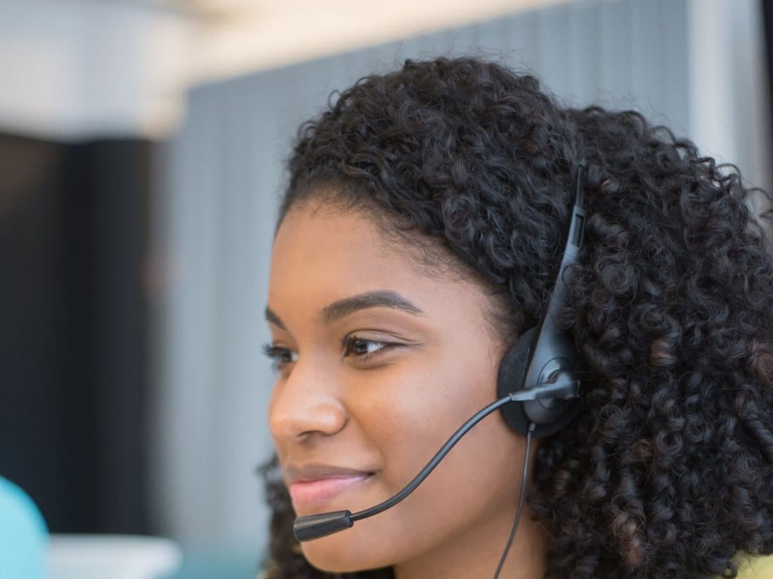 A bilingual iCall Connect agent at the operations center